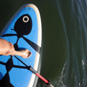 Person paddleboarding with accessories